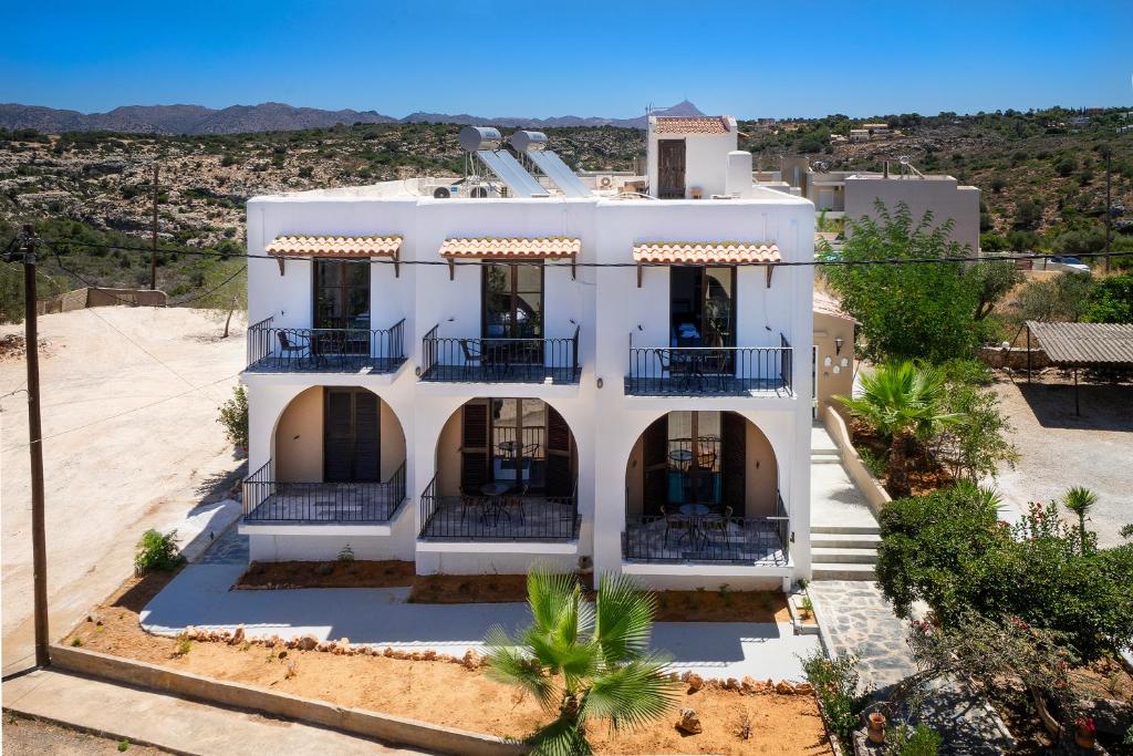 an aerial view of a white house at Anastasia Veridian Living in Kalathas