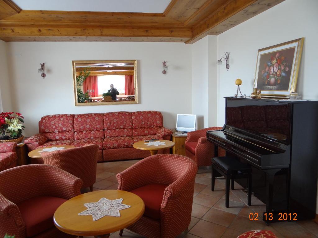 Posezení v ubytování Hotel Mondeval