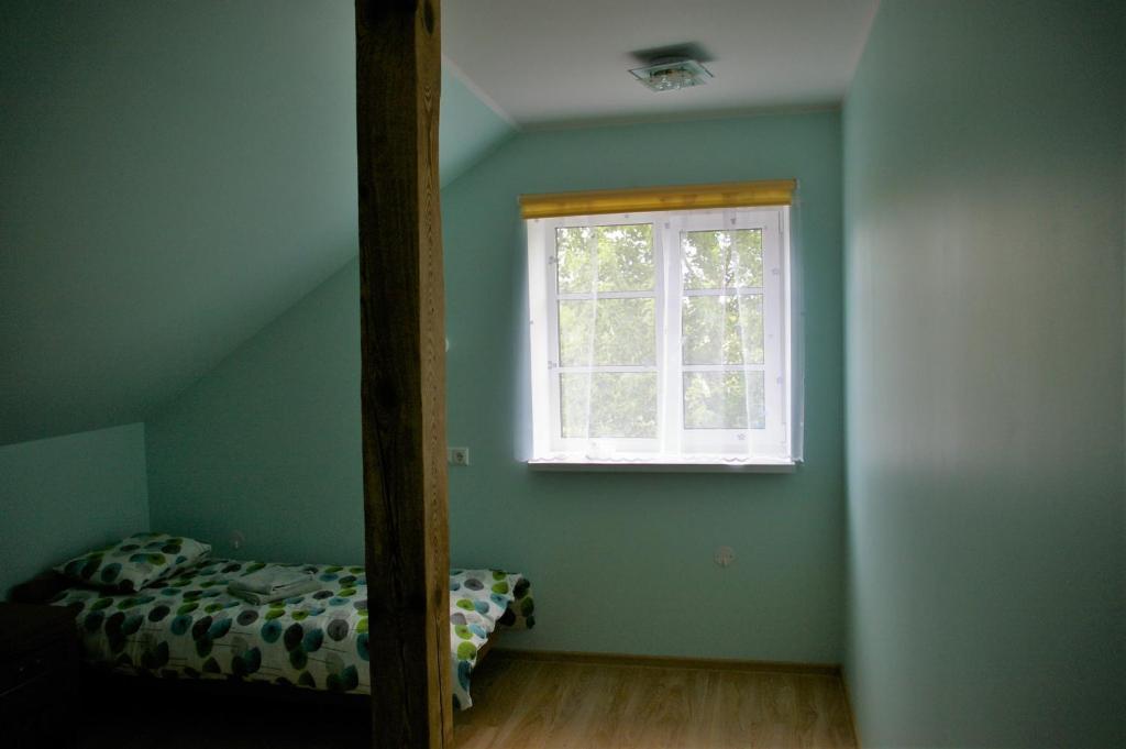 Postel nebo postele na pokoji v ubytování Kagu Hostel