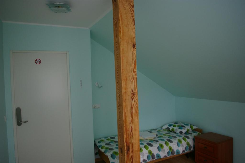 Postel nebo postele na pokoji v ubytování Kagu Hostel