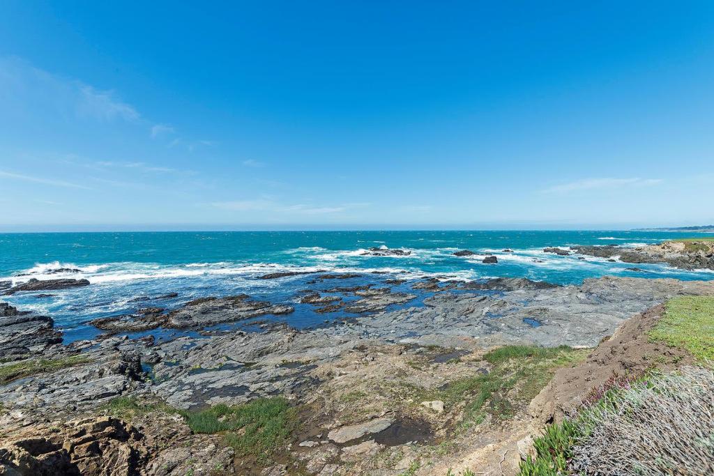 a view of the ocean from a rocky beach at Haltwhistle West With Ocean Views in Sea Ranch