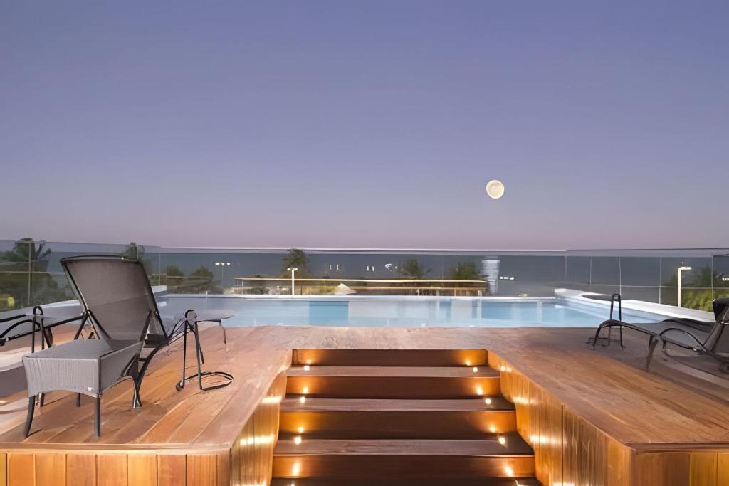 Πισίνα στο ή κοντά στο Flat à beira-mar Infinity at the Sea - MyFlats Hospedagens