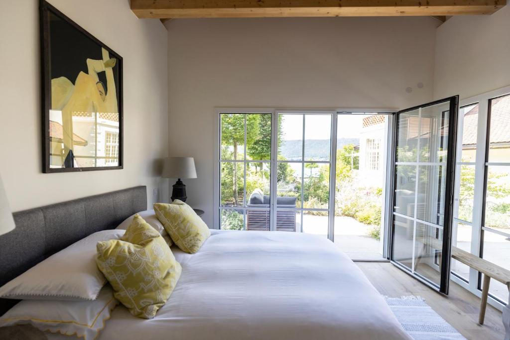 En eller flere senge i et værelse på Villa des Pensières