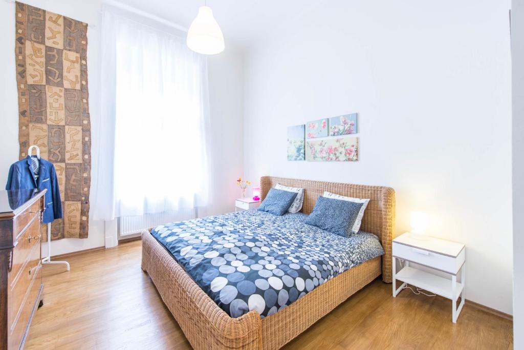 A bed or beds in a room at API Flat