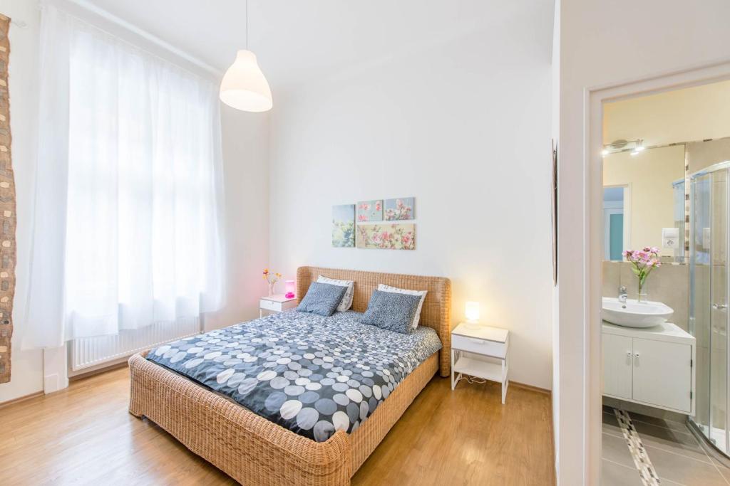A bed or beds in a room at API Flat