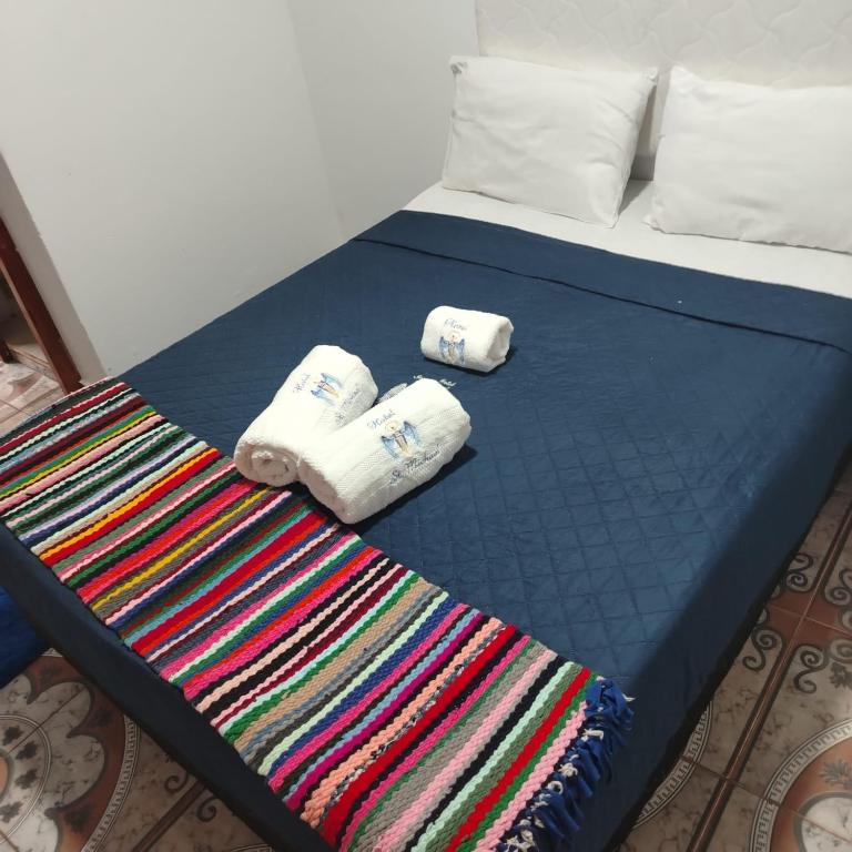 Postel nebo postele na pokoji v ubytování Hotel Saint Michael