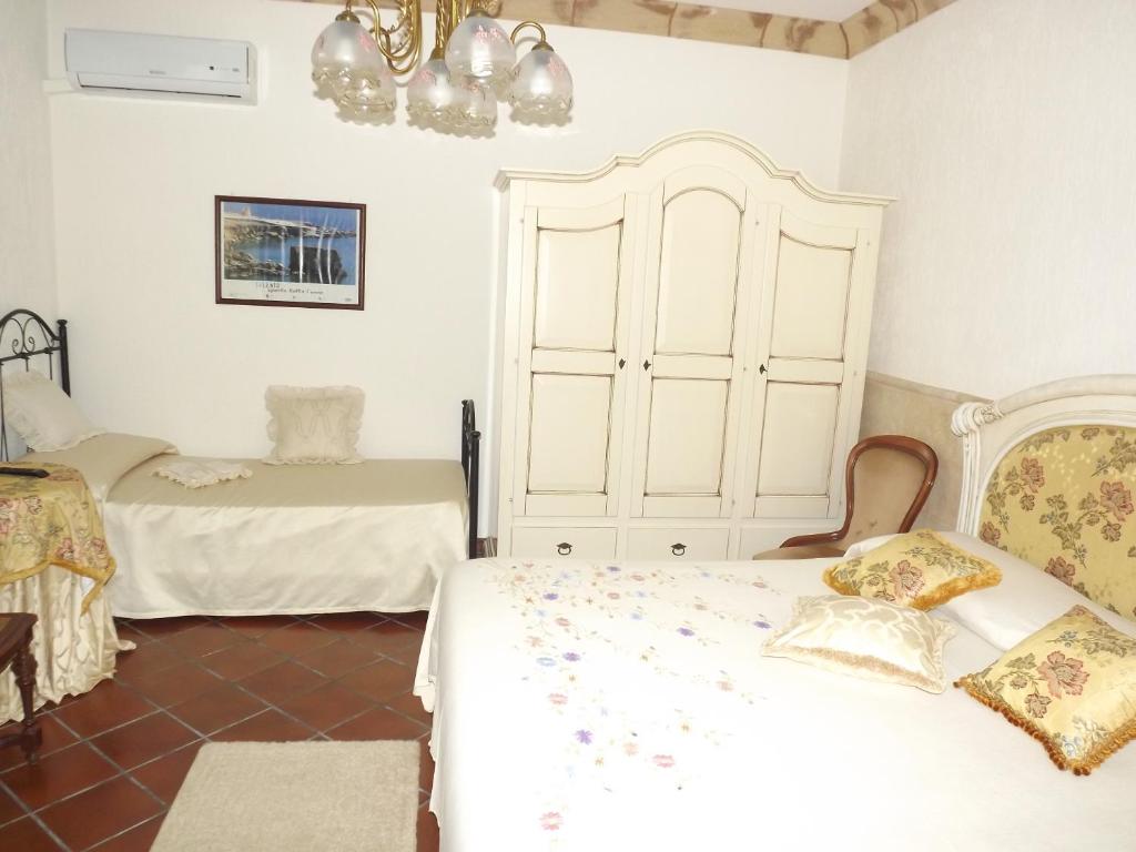Postel nebo postele na pokoji v ubytování B&b La Balaustra