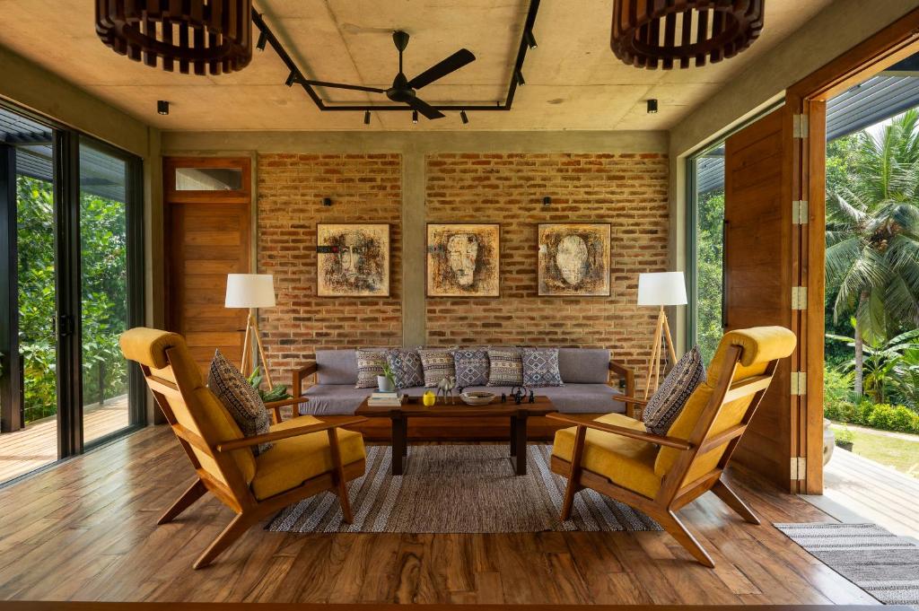 Posezení v ubytování Thompson Heights Luxury Villa in Galle
