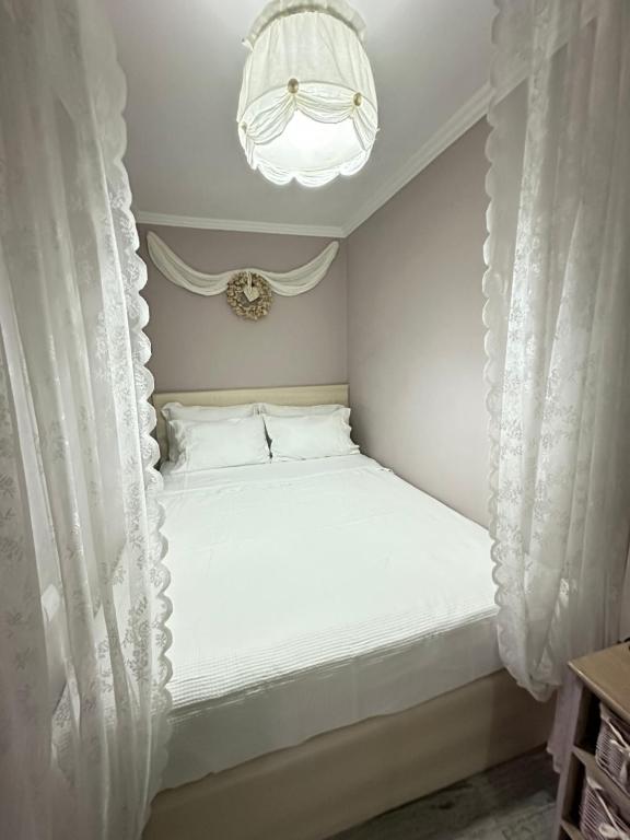 Ένα ή περισσότερα κρεβάτια σε δωμάτιο στο Hydrangea