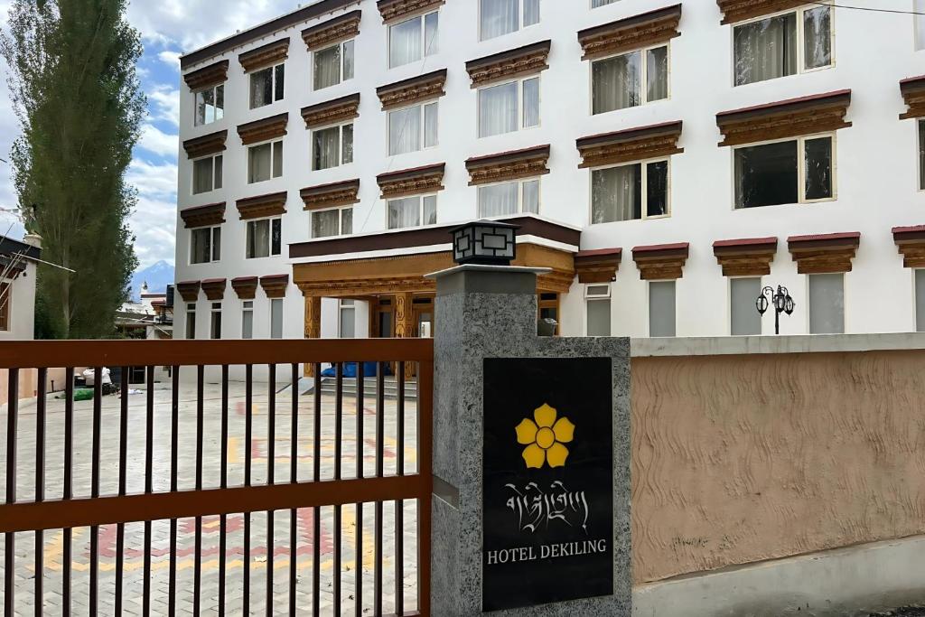 a building with a gate in front of it at Hotel Dekiling by Eastlynn Collections in Leh