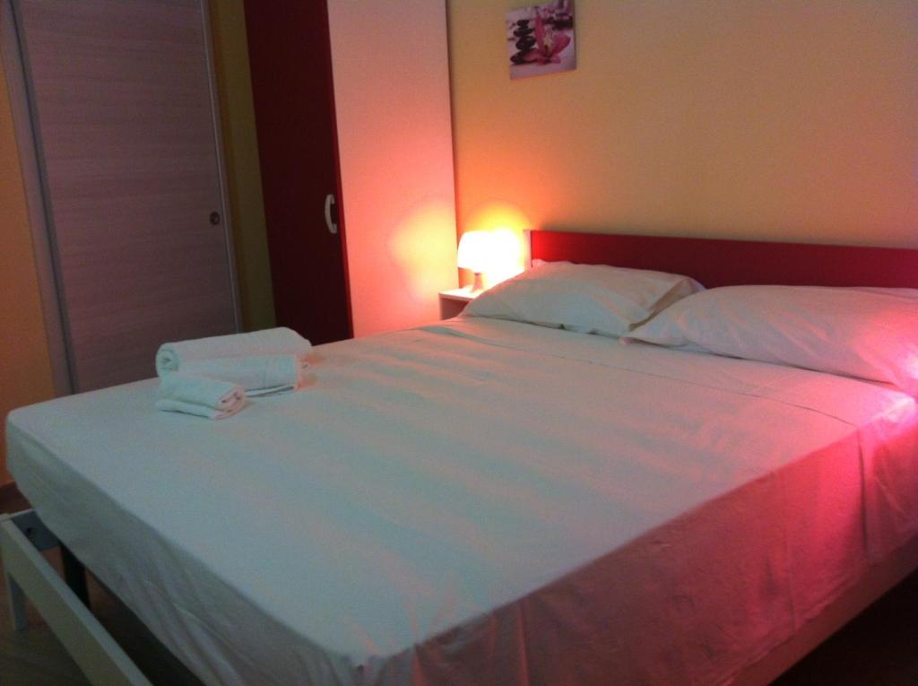 Llit o llits en una habitació de Bed & Breakfast Le Torri