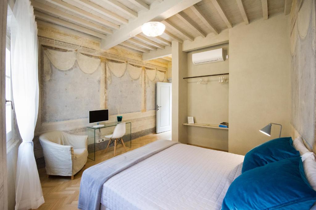 Posteľ alebo postele v izbe v ubytovaní Il Piccolo Cavour Charming House B&B