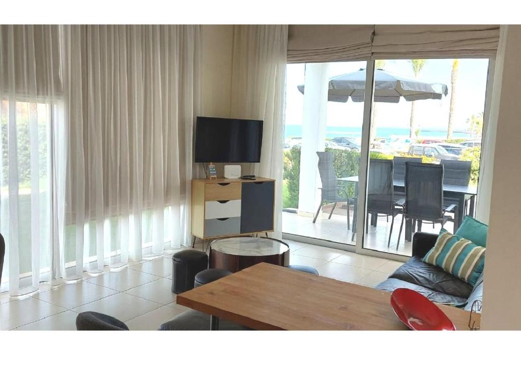 TV a/nebo společenská místnost v ubytování Villa Sorelle