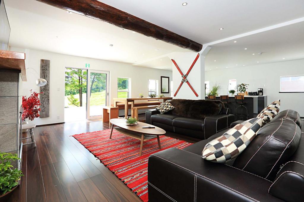 Et opholdsområde på Hakuba Slopeside Chalet