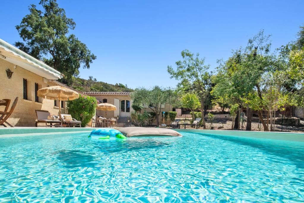 Πισίνα στο ή κοντά στο Chez Nous Baraille - Appt climatisé avec piscine