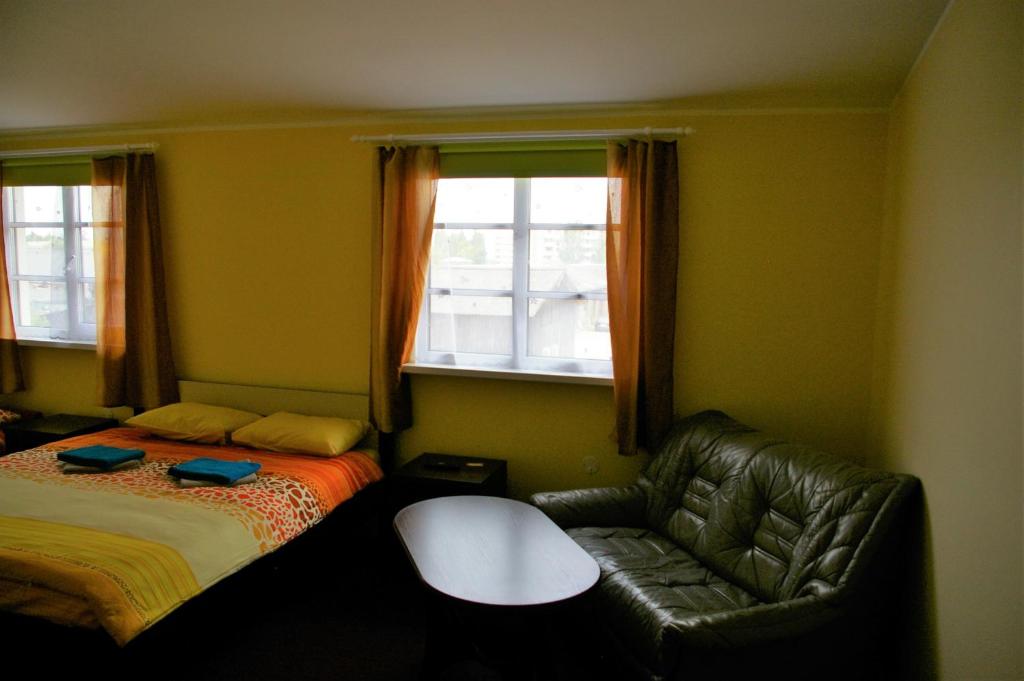 Postel nebo postele na pokoji v ubytování Kagu Hostel