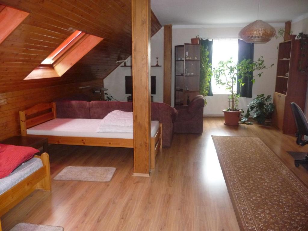 Postel nebo postele na pokoji v ubytování Apartment Rychtrovna