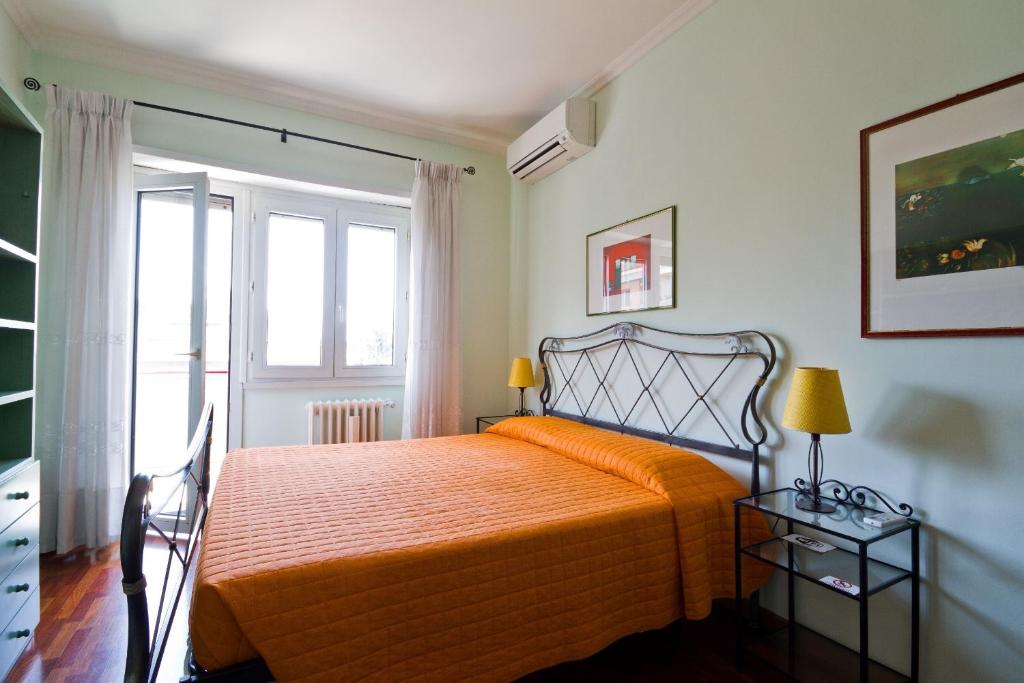 Кровать или кровати в номере B&B Roma Appia Davila25