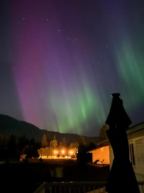 an image of the northern lights in the sky at Beautiful home near City centre! in Kitimat