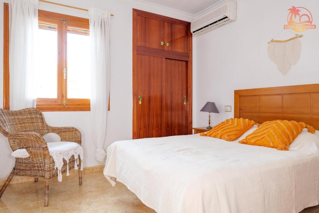 Postel nebo postele na pokoji v ubytování Casa Tulipanes - Santiago de la Ribera - San Javier