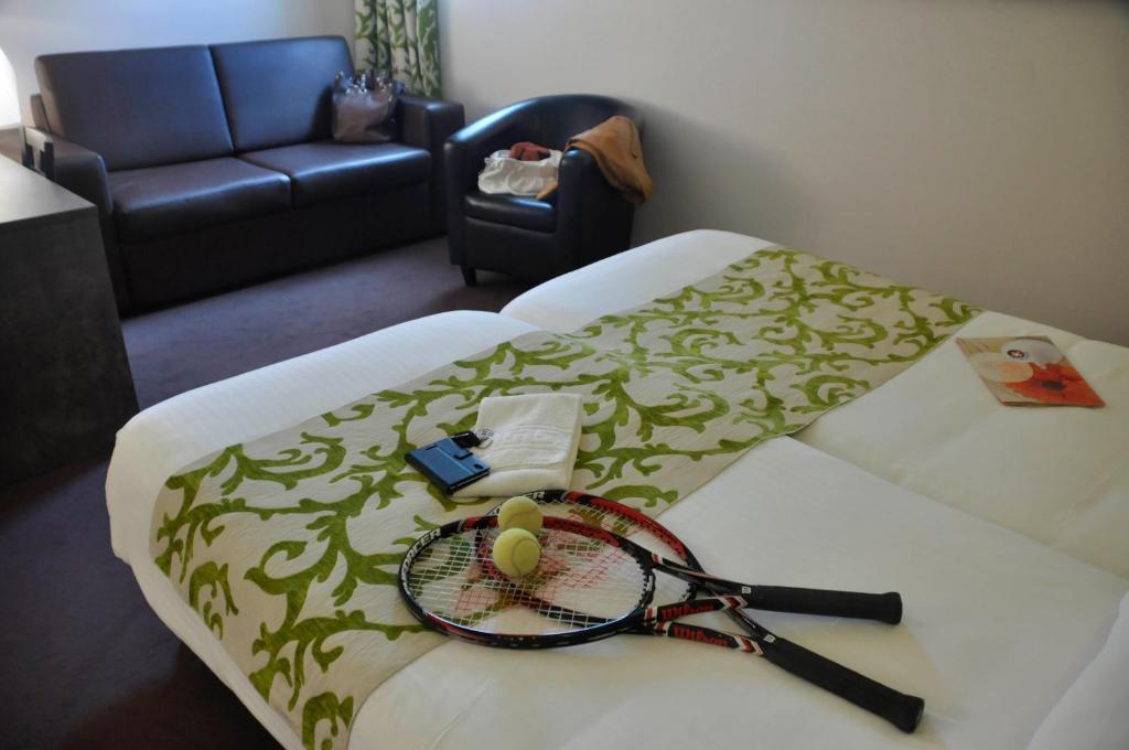 Posezení v ubytování BRIT HOTEL CONFORT ALEXIA - La Souterraine