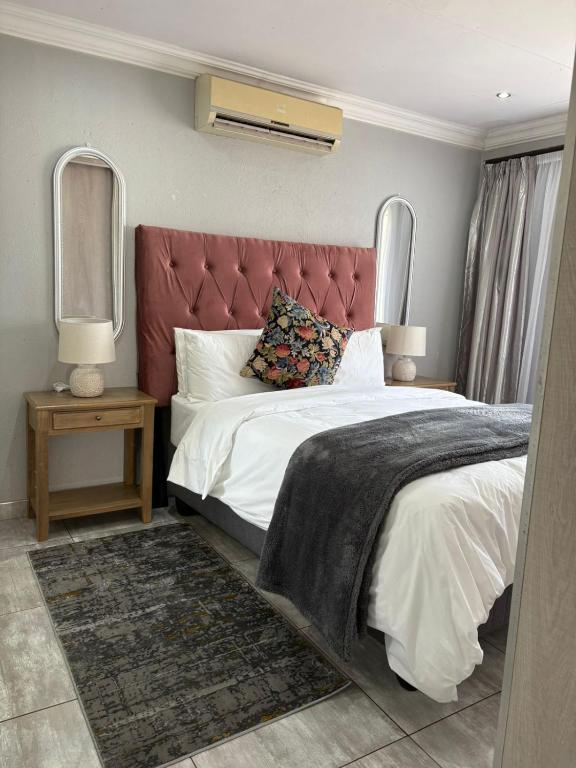 Katil atau katil-katil dalam bilik di Lulu's guest house