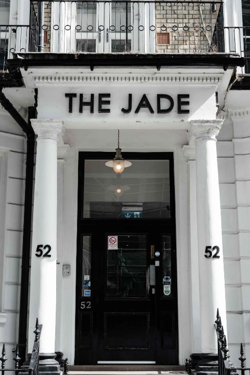 a building with the jade sign above a door at The Jade in London