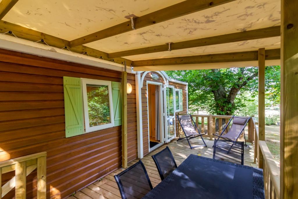 Balkón nebo terasa v ubytování Mobilhome 4 personnes climatisé