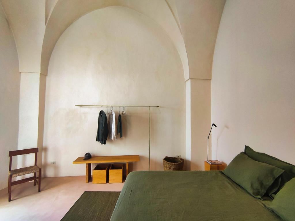 Postel nebo postele na pokoji v ubytování Casa Micocci di Casa Camilla Journey