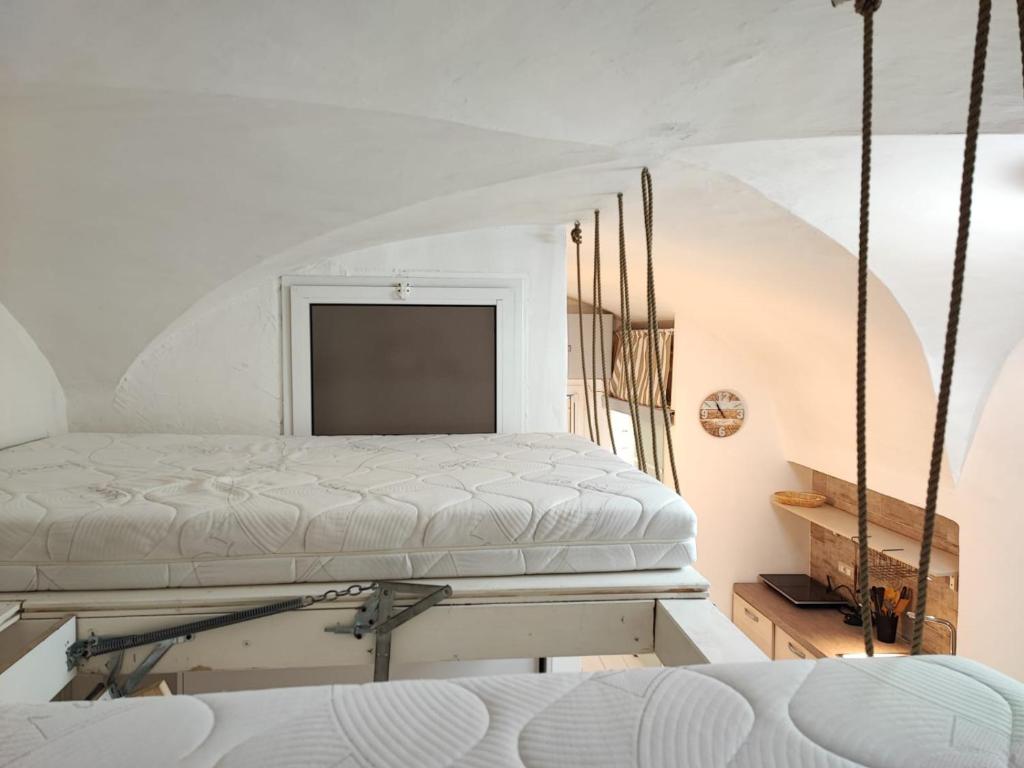 En eller flere senge i et værelse på Mama sweet home