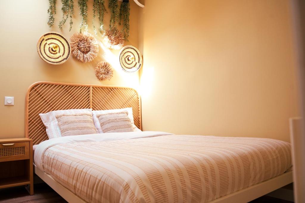 Postel nebo postele na pokoji v ubytování La Parenthèse Savane