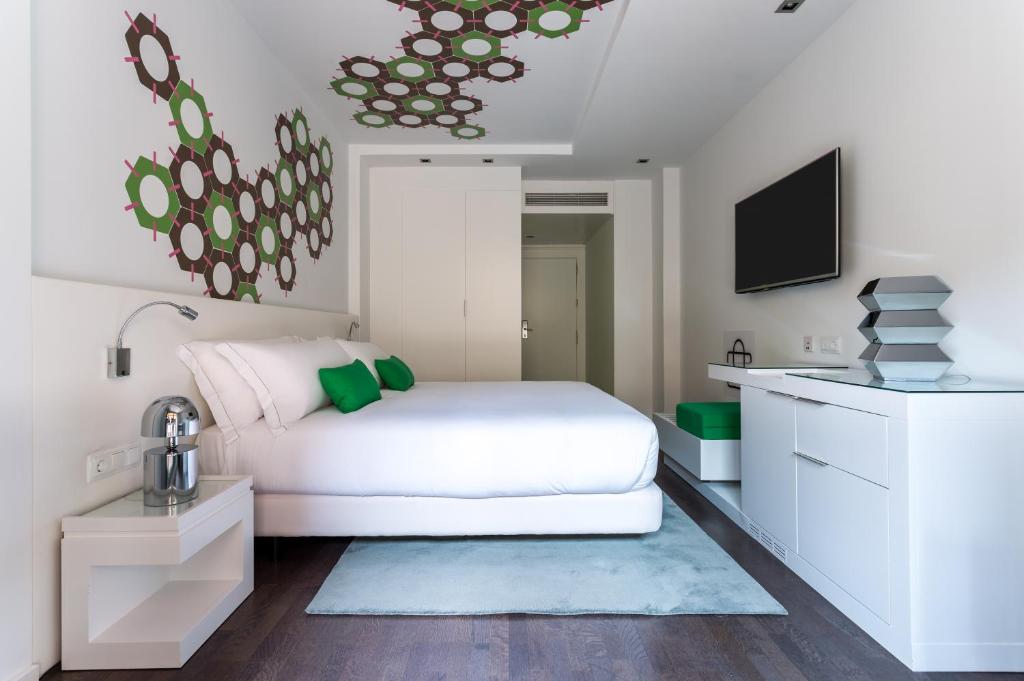 Postel nebo postele na pokoji v ubytování Room Mate Carla, Barcelona