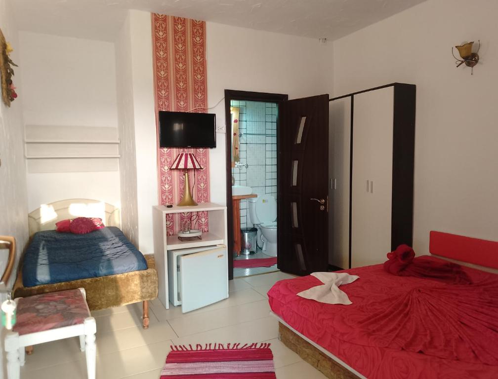 Postel nebo postele na pokoji v ubytování Samaya