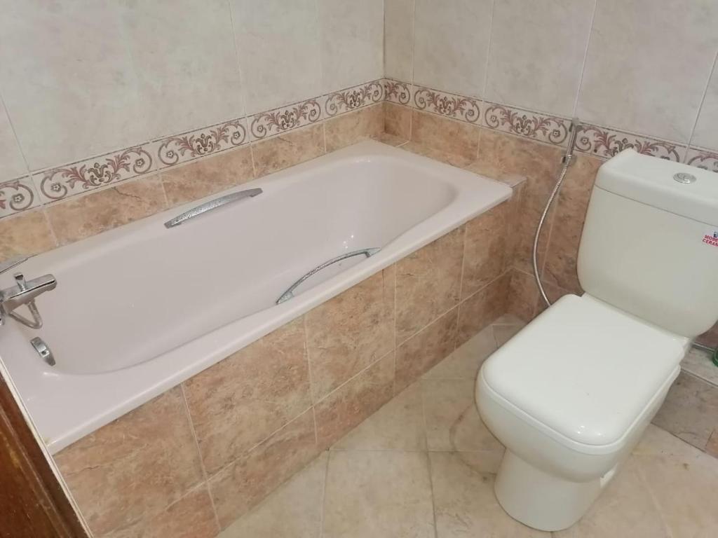 Ένα μπάνιο στο Sun City Apartment