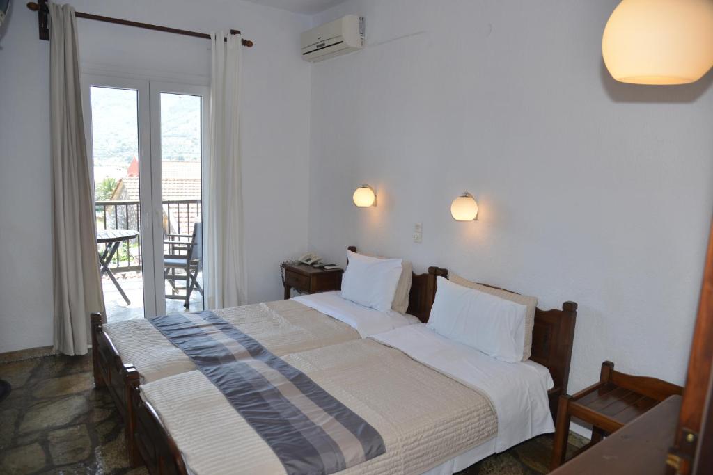 Postel nebo postele na pokoji v ubytování Hotel Anelli