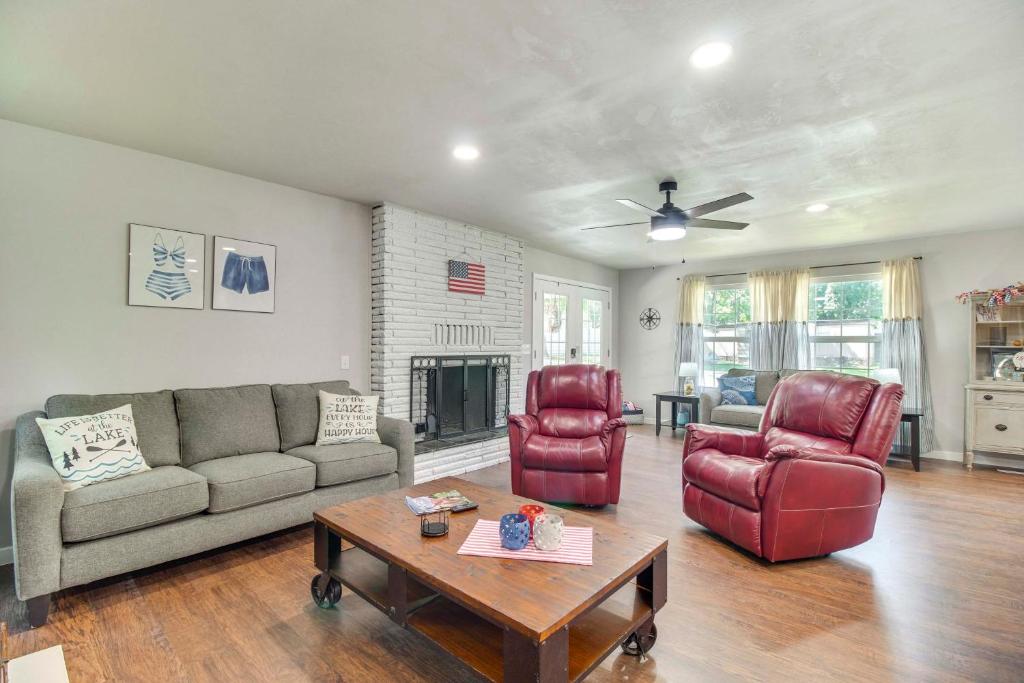 a living room with a couch and two chairs and a table at Walk to Marina and Lake Family Retreat in Afton! in Afton