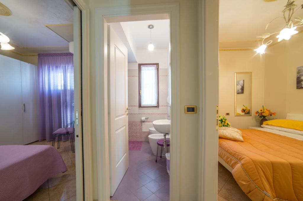 Postel nebo postele na pokoji v ubytování Airport House B&B