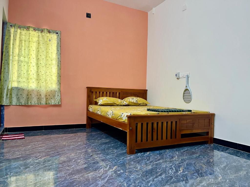 Postel nebo postele na pokoji v ubytování 1Bhk Private Flat by Shivalaya in Coimbatore city