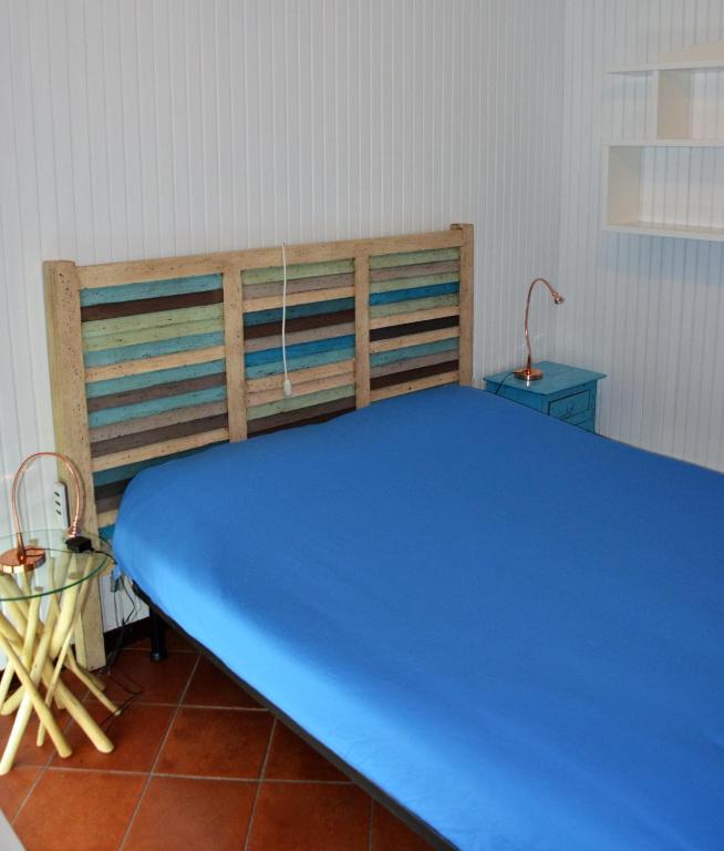 Postel nebo postele na pokoji v ubytování La Casa di Enrico