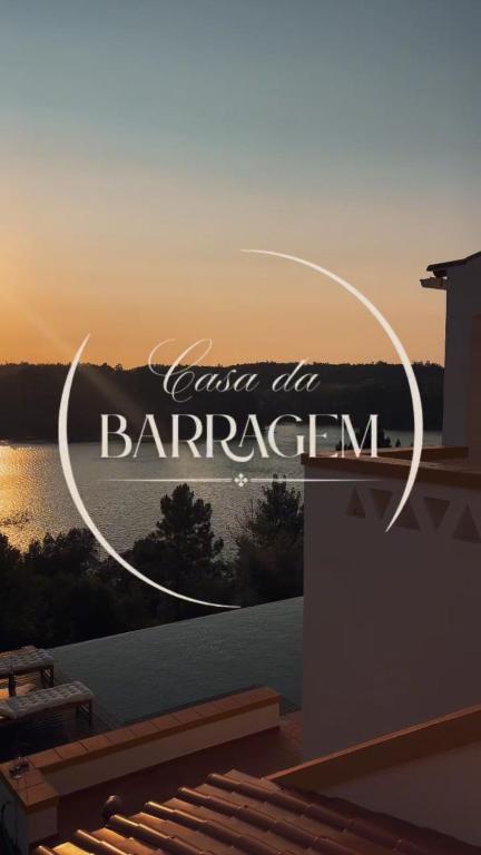 a sign with the words rent the bararcacion in the sunset at Casa da Barragem - Castelo de Bode in Castelo do Bode