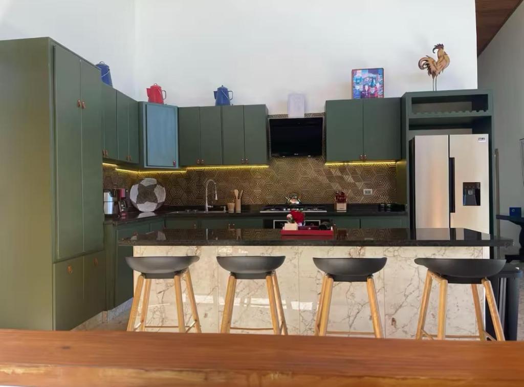 Kuchyň nebo kuchyňský kout v ubytování Villa Rancho Arriba