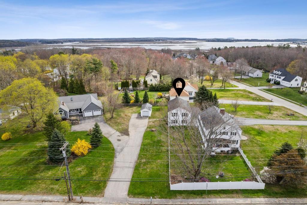 an aerial view of a neighborhood with houses and trees at The Coastal Nest - Stay for 5 in Scarborough