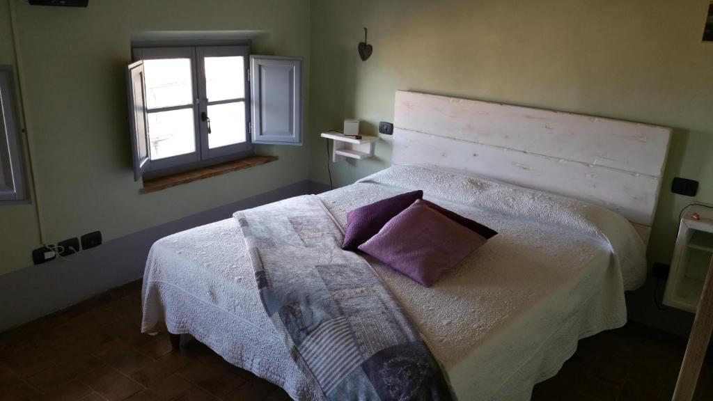 Postel nebo postele na pokoji v ubytování Scalette di Piazza B&B