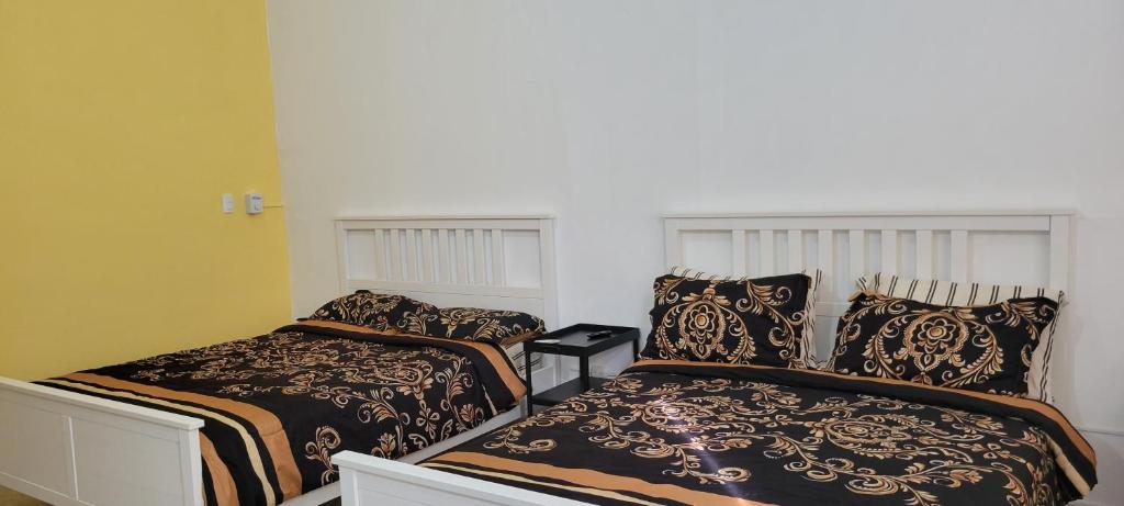 Un ou plusieurs lits dans un hébergement de l'établissement Room 6