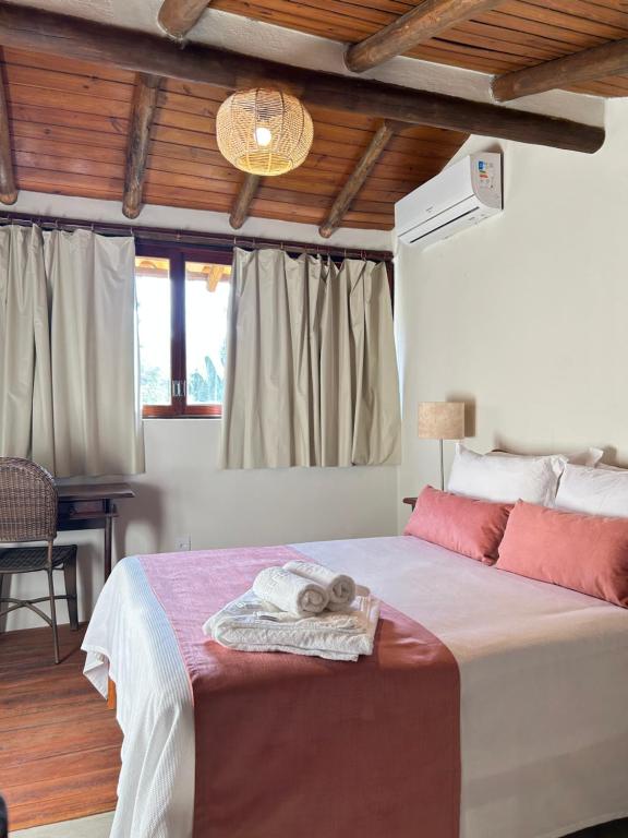 Ένα ή περισσότερα κρεβάτια σε δωμάτιο στο Flats Bon Voyage Caboré - Chez Cira