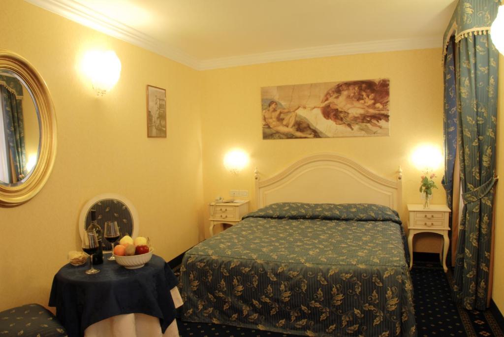 Voodi või voodid majutusasutuse Hotel Ca' Formenta toas