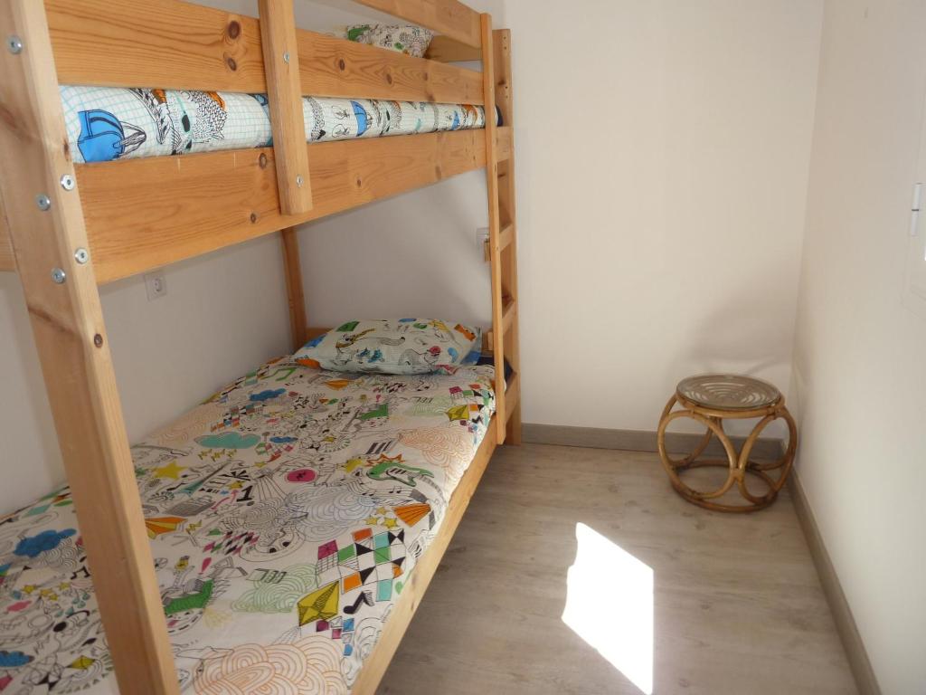 En eller flere senge i et værelse på Villa service - Casa Jordi