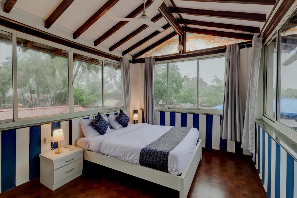 Postel nebo postele na pokoji v ubytování Backspace Anjuna Beach