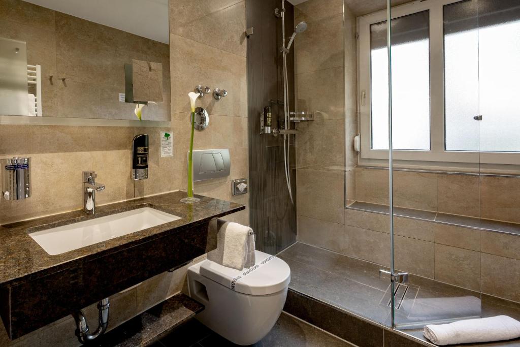 TIPTOP Hotel Burgschmiet Garni - Resim 39