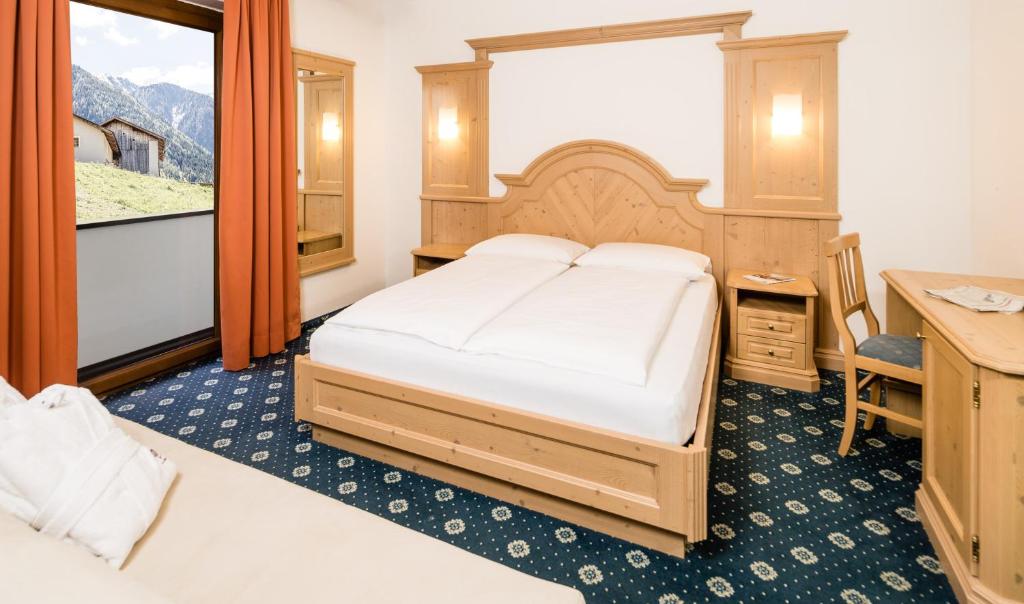 Postel nebo postele na pokoji v ubytování Hotel Almina